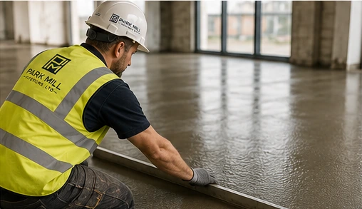 PMI operative levelling a freshly installed floor screed